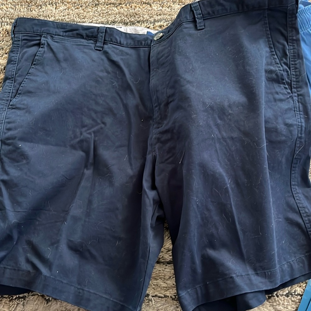 Pair of men’s shorts size 46 navy blue shorts snd size 3XL ivory colored shorts